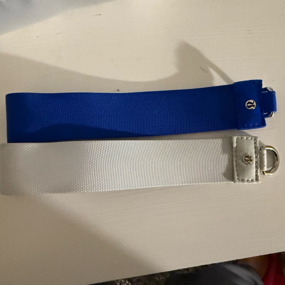 white and blue lululemon keychains